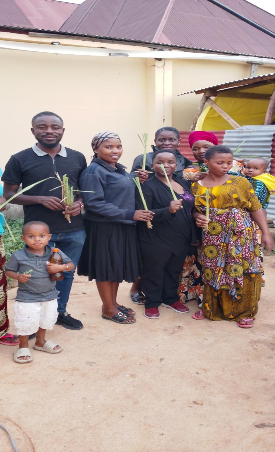 Fig 3: Women received lemongrass seedlings.